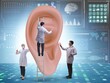 © Elnur - Doctor examining giant ear in medical concept