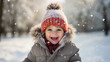 © Meow Creations - Portrait of a cute little boy having fun in winter park.