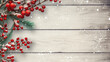 Snow-covered red berries and pine branches create a festive border on a rustic wooden backdrop