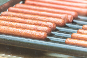 Poster - Sausages are fried on the grill