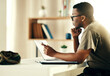 © aLListar/peopleimages.com - Black man, laptop and reading military information, planning or army surveillance indoor at base. Computer, soldier and concentration on web research at data center for cyber security and protection