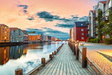 Fototapeta Nowy Jork - Amazing sunset over the Nidelva river in Trondheim, Norway