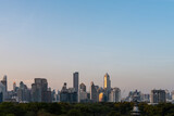 Fototapeta Zwierzęta - Bangkok panoramic skyline with office buildings and park. Copy space
