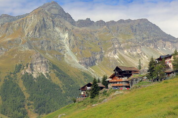 Wall Mural - paesaggio di  montagna italiano con baite, italian mountain landscape with cottages