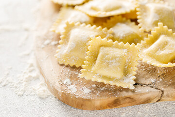 Poster - Cooking ravioli on a floured kitchen table