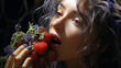 close up of woman lips holding a red berry.