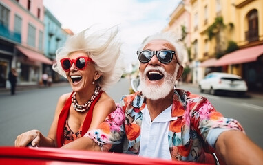 Wall Mural - Senior couple have fun together and drive cabrio car around the city, unusual date concept