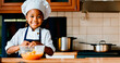 A happy African American little girl wearing a chef outfit cooking in the kitchen,