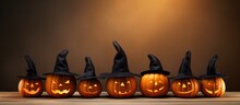 Halloween Banner With Pumpkin Silhouettes And Jack O Lanterns In Witch Hats