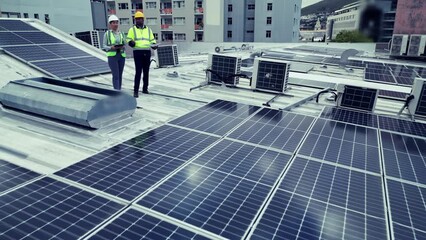 Poster - Teamwork, drone and solar engineers on roof, planning and people outdoor in city. Technician, photovoltaic panels and collaboration on rooftop for discussion on tablet, blueprint or renewable energy