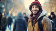 stockphoto, copy space, Cheerful male abroad student on campus with other students walking in background, winter scene. Young adult people, education, winter. Young male student on the campus. Outdoor