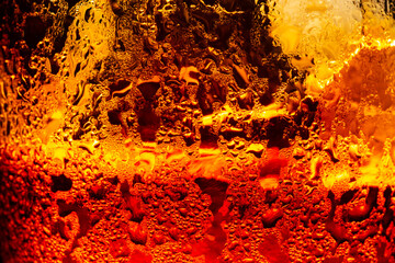 Wall Mural - Macro cola drink texture,macro cola background,Background of cola with ice and bubbles. Side view background of refreshing cola flavored soda with carbonated with vintage tone,Thailand, Turkey - Middl