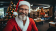 An office worker in a Santa Claus costume. Christmas.