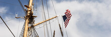 Panoramic Image. American Flag On The Mast Of A Sailing Ship