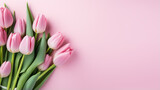 Fototapeta Tulipany - Bouquet of colorful tulip flowers, white wall, space for text, copy space