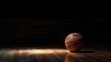 Fototapeta Sport - basketball ball in a dark room