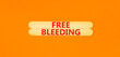© Dzmitry - Free bleeding symbol. Concept words Free bleeding on wooden stick. Beautiful orange table orange background. Gen Z, motivational, freedom free bleeding concept. Copy space.