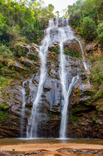 Waterfall Among The Trees Of The Brazilian Rainforest
