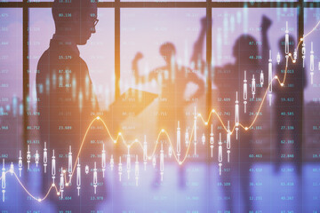 Wall Mural - European businessmen and women working together in blurry office interior with glowing candlestick forex chart and index hologram on blurry background. Trade and stats concept. Double exposure.