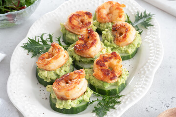 Wall Mural - Shrimps, cucumber and avocado guacamole, party food, finger food