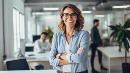 Wall Mural - Happy female designer standing in office 