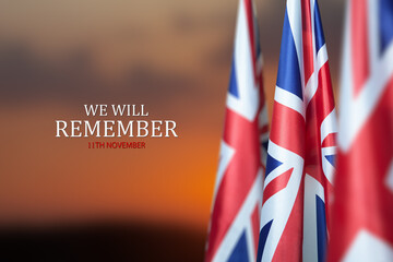 Wall Mural - Flag of Great Britain with Text on background of sunset. Holidays of the UK. Remembrance Day.