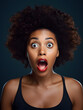 portrait of a black woman with surprised, shocked expression, wide eyes, open mouth