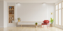 Mockup A TV Wall Mounted With Red Armchair In Living Room With A White Wall