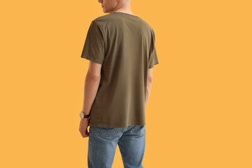 Sticker - Man in stylish t-shirt on orange background