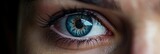 Fototapeta  - Close-up of a woman's left blue eye.