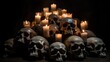 Close up of a dark scene with candles and a human skull