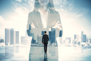 Canvas Print - Young businesswoman and man standing on white bright city background with mock up place. Future, success and career concept. Double exposure.