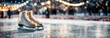 Ice skates on the ice rink, banner for ice rinks and winter events, website header, background with copy space, winter concept of leisure and activities during winter holidays