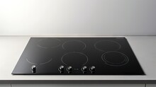 Flat cooktop cooking induction electric built black stove. Grey countertop with black glossy built in ceramic tempered glass induction or electric hob stove cooker with four burners in kitchen.