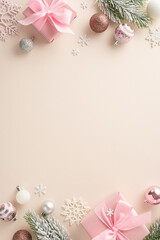 Glitzy Festive scene. Overhead vertical view of pink-wrapped gifts, endearing ornaments, glistening balls, snowflake details, frosty pine twigs on pastel backdrop, room for greeting or promo content