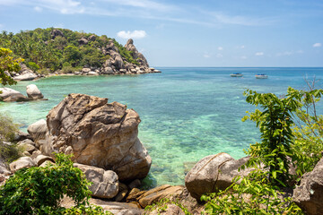 Wall Mural - Scenery idyllic tropical famous Freedom Beach with clear turquoise sea water and rocks on Koh Tao island in sunny day. Best picturesque travel destinations of Thailand