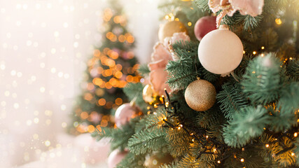 Wall Mural - Christmas tree branches with decorations, balls, garlands, bokeh. Postcard with space for text.	