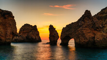 Scenic Sunrise Landscape Of Algarve Beach With Wonderful Rock Formation, Ponta Da Piedade, Algarve, Portugal