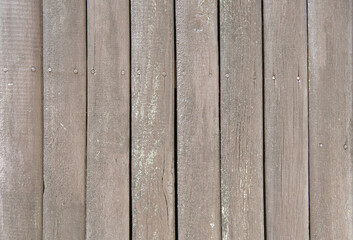 Wall Mural - Close up of brown painted wooden fence panels.