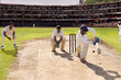 © IndiaPix - Batsman hitting the ball on the leg side while playing a cricket match