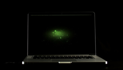 Wall Mural - Modern laptop glows in the dark, connected to wireless network generated by AI