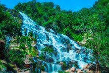 Amazing Deep Forest Big Waterfall At Mae Ya Waterfall, Doi Inthanon National Park Chiangmai, Thailand. Translate Text " Mae Ya Waterfall "