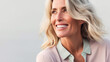 Beautiful mature woman with wavy long grey hair smiling. Active lifestyle positive mindset fashion concept
