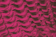 Red fuchsia color abstract background, bicycle chain
