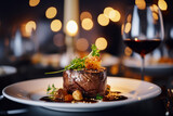 Fototapeta Do akwarium - Close up of delicious gourmet main dish meat on table in bokeh lights with elegant resturant. Special course meal concept for events and celebrations. 