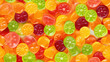 Seamless pattern of assorted jelly gum fruit candy top view flat lay