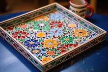 Colored Mosaic Tiles Arranged On Tray