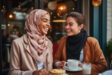 Fototapeta  - young muslim friends laughing over coffee