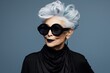 © SD Danver - Glamour old lady face portrait, studio empty background. Grandma in black luxury clothes style. Granny model in modern fashionable makeup. Trendy cool aged woman model, generated by AI