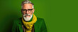 Portrait of a 60 year old fashionable hipster on bright color studio background